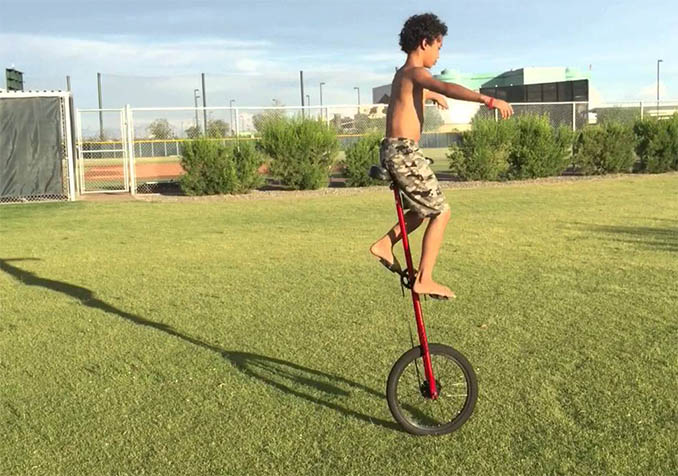 Step-by-Step get on a giraffe unicycle